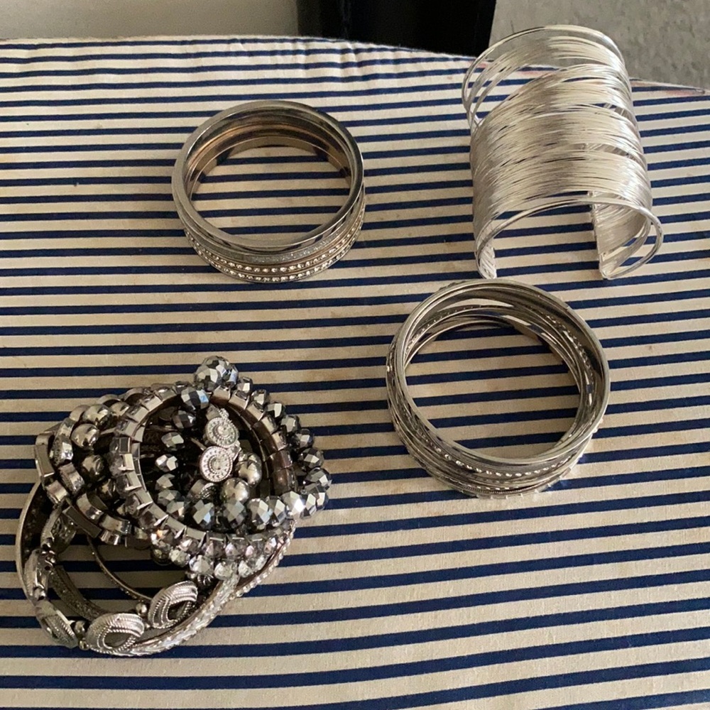 Various silver bracelets and jewelry